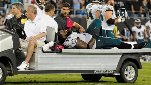 Philadelphia Eagles' Jason Peters (71) is carted off the field after suffering a back injury Sunday night.