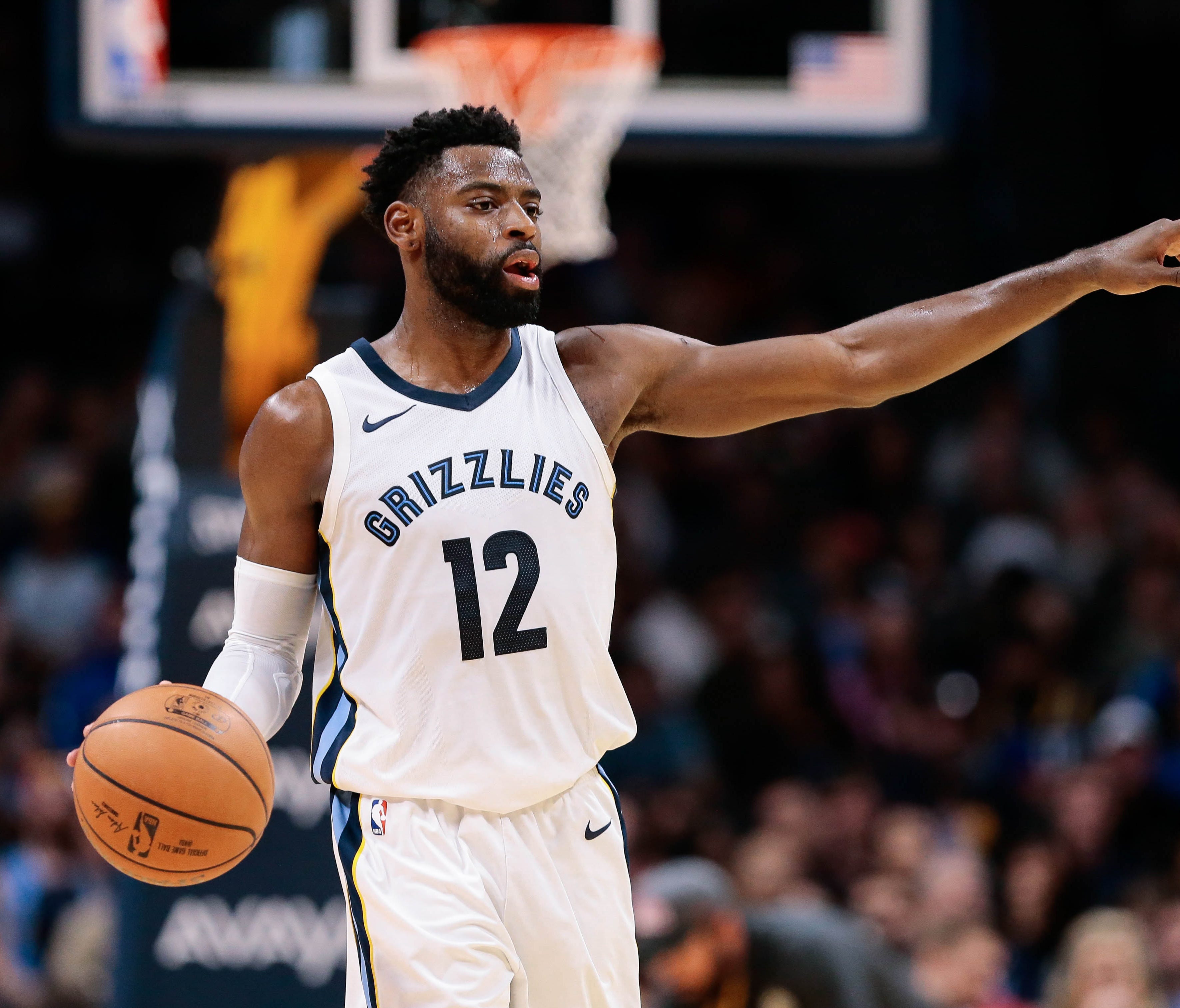 Memphis Grizzlies guard Tyreke Evans (12) motions in the fourth quarter against the Denver Nuggets at the Pepsi Center.