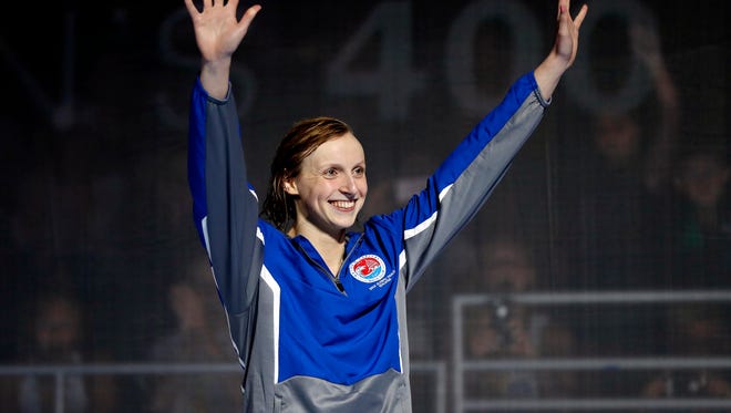 Ledecky celebrates after winning the women's freestyle 400m final in the U.S. Olympic swimming team trials.