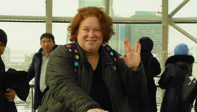 Lynette Ray at the top of the Baiterek monument in Astana, Kazakhstan.