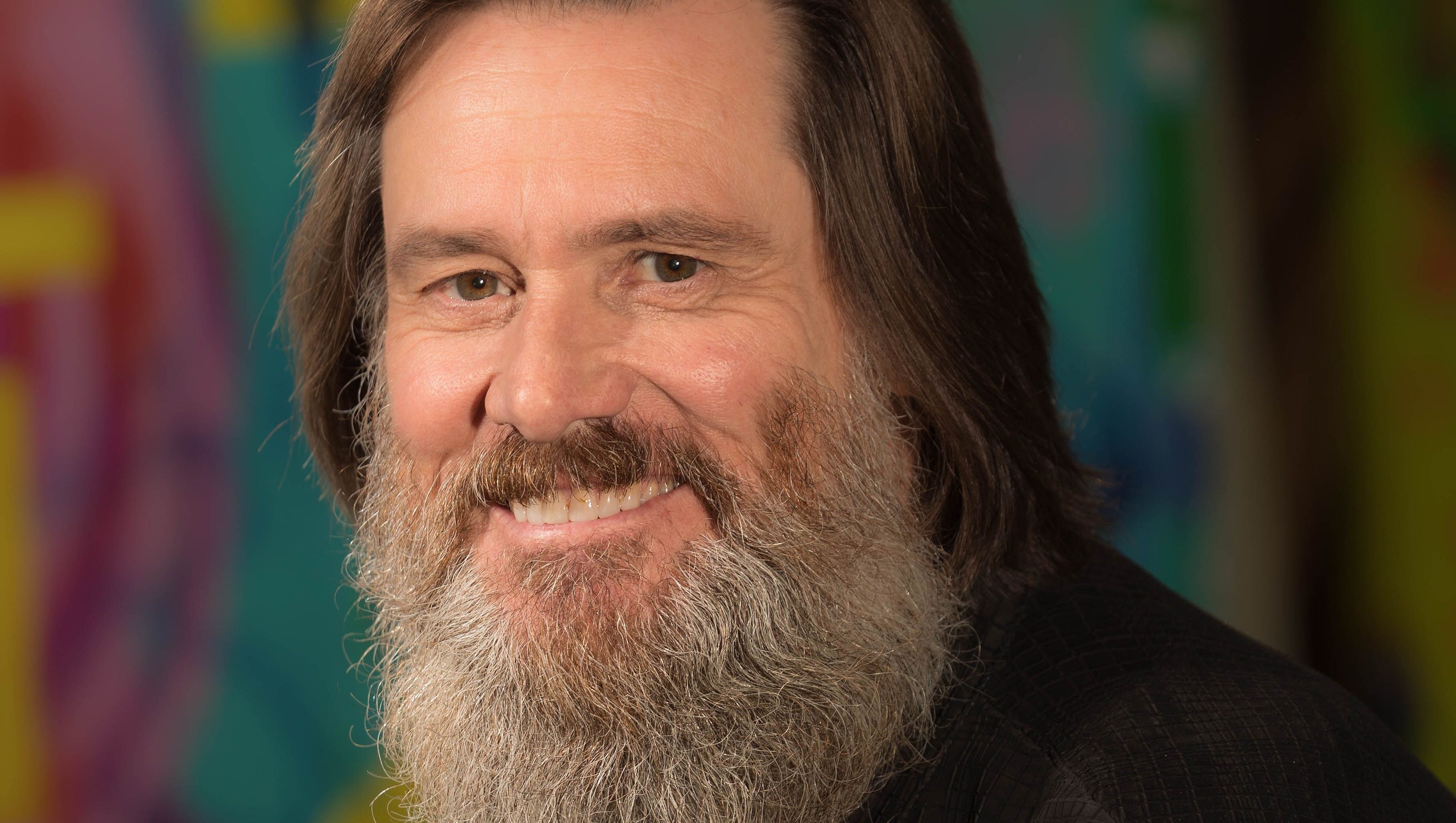 Jim Carrey's newest character is as plain as the beard on his face.