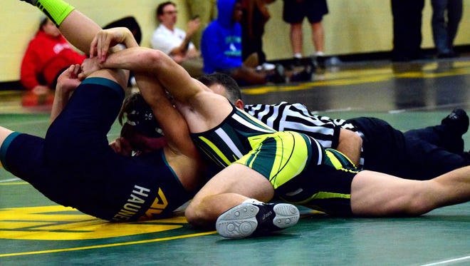 Little Miami junior Casey Lawrence (front) is 17-2 at 138 pounds this season.
