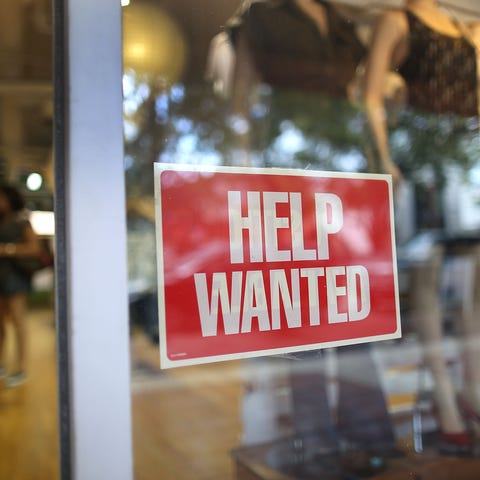 File photo taken in 2015 shows a help wanted sign 