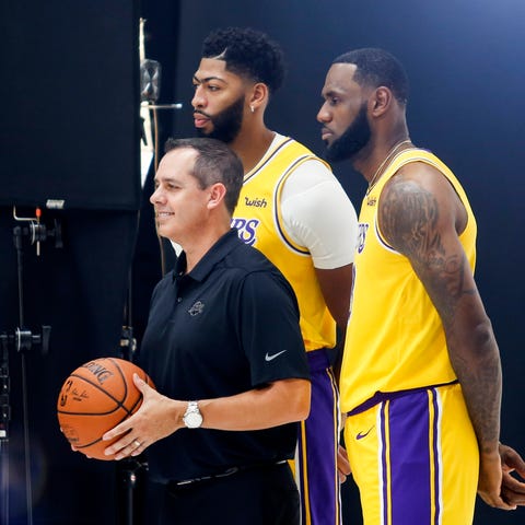 Los Angeles Lakers head coach Frank Vogel, left, f