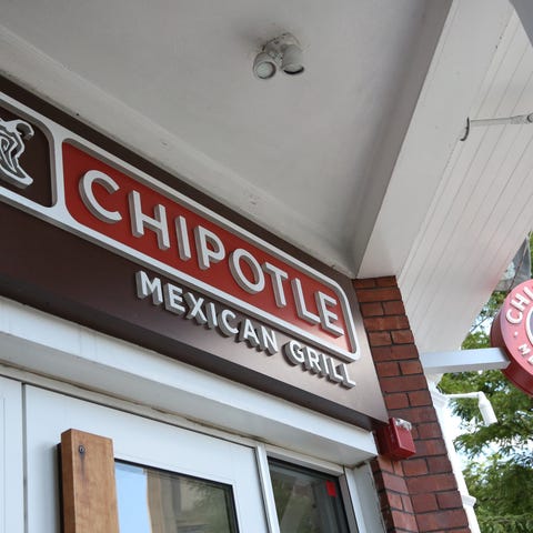 The Chipotle sign on the front of one of its resta