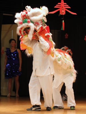 A traditional Lion Dance is performed by the Huaxia Chinese School of Greater New York, during the 2015 Chinese New Year Festival at the Westchester County Center in White Plains, Feb. 7, 2015. People were treated to Chinese culture through dance, music, food and art. The event was organized by the Westchester Association of Chinese Americans.