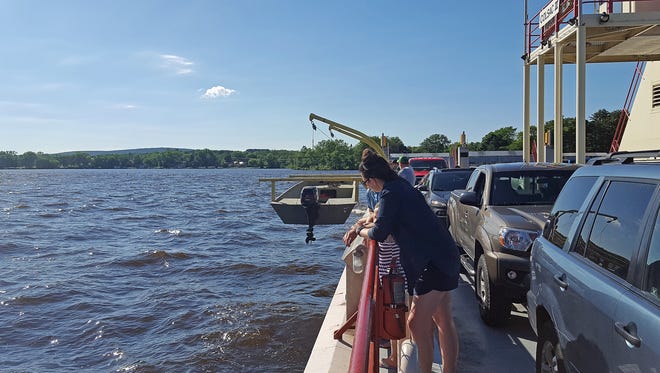 The free Merrimac Ferry takes cars and passengers across the Wisconsin RIver at Merrimac.