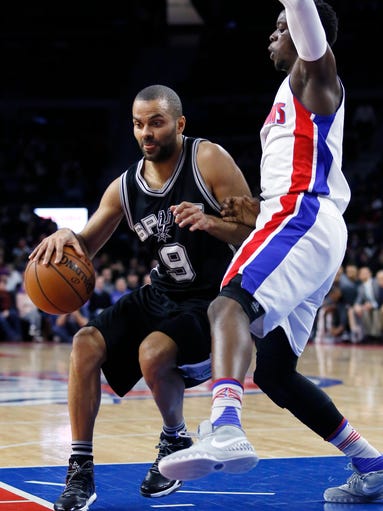 San Antonio Spurs' Tony Parker (9) drives against Detroit