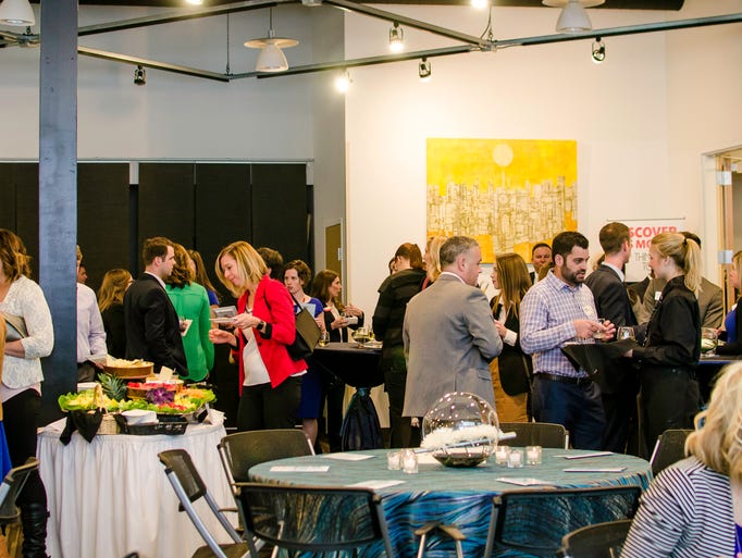 The crowd mingling at the Central Iowa YP of the year
