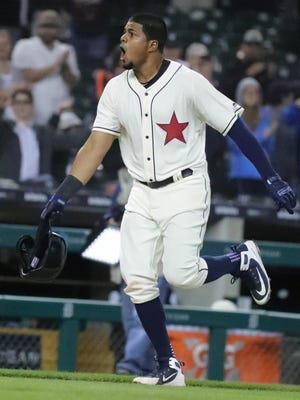 Jeimer Candelario celebrates his walk-off homer in the 12th inning against the Indians on Saturday at Comerica Park.