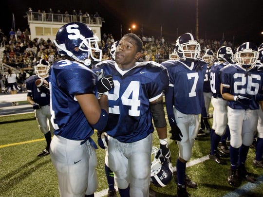 Middletown South's Knowshon Moreno (24) is congratulated