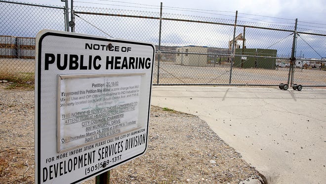 A notice of public hearing sign concerning a solar farm the San Juan Regional Medical Center wants to install is seen Friday on South Drake Avenue in Farmington. The city did not approve the zoning needed for the project.