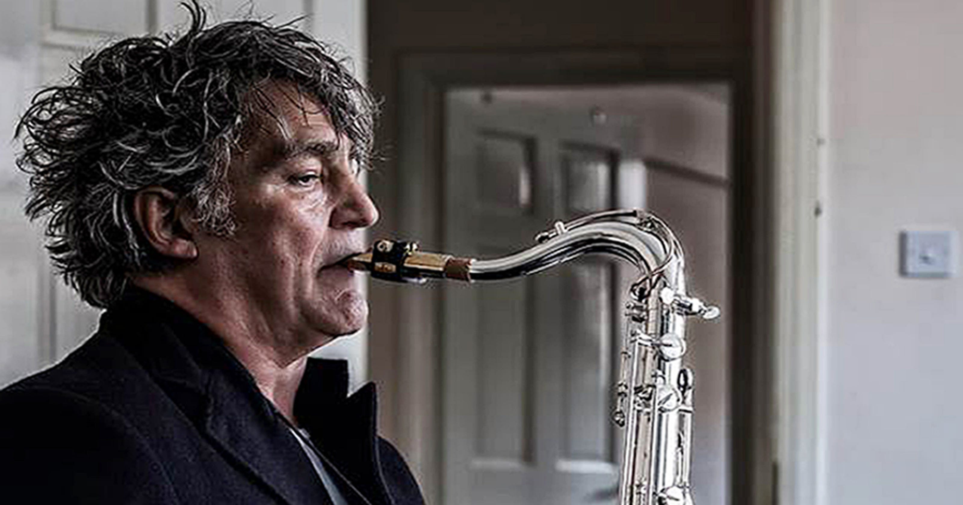 Sax player behind 'Baker Street' solo dies at 60