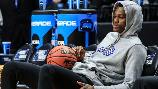 Kentucky's Jarred Vanderbilt looks a bit glum while watching his team practice Wednesday, March 14, 2018, before the Wildcats' opening game against Davidson in the Taco Bell Arena in Boise, Idaho. In late September, Vanderbilt fell to the ground with a left foot injury during a drill in practice that cost him more than three months of practice and games.