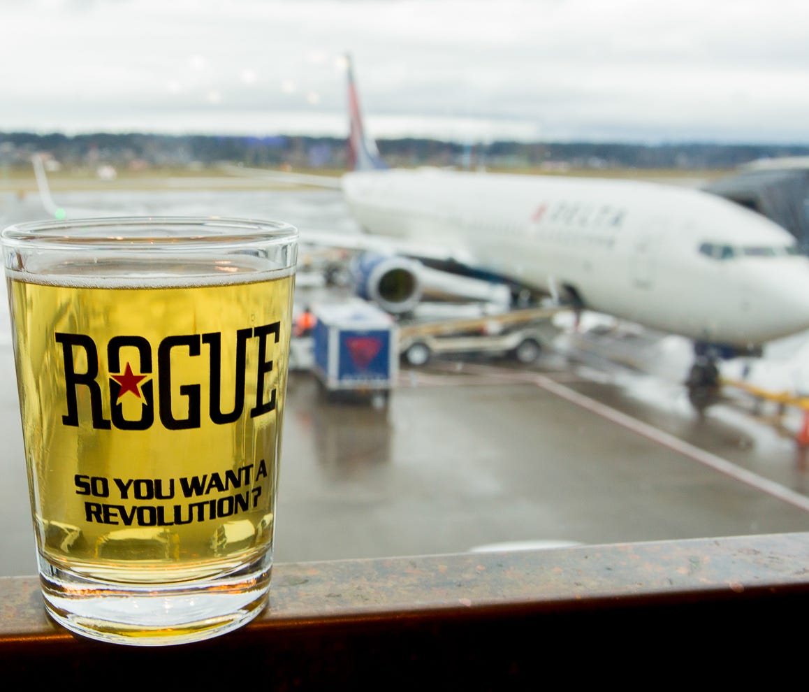 A taster from Rogue Brewery rests on a table at the brewer's Portland (Ore.) International Airport location in February 2017.