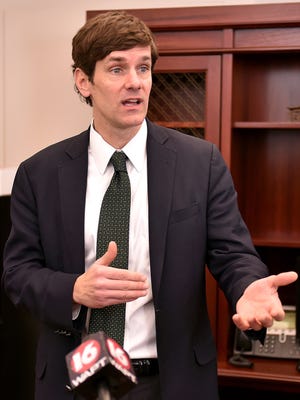 Mississippi State Epidemiologist Thomas Dobbs speaks during a news conference at Jackson City Hall in January. Dobbs is expected to announce his resignation soon.