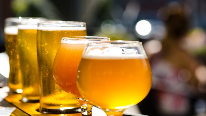 image of many beer glasses filled with beer