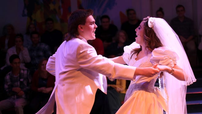 Stockton Myers plays Robbie Hart and Sara Warr plays Julia Sullivan in St. George Musical Theater’s production of “The Wedding Singer.”
