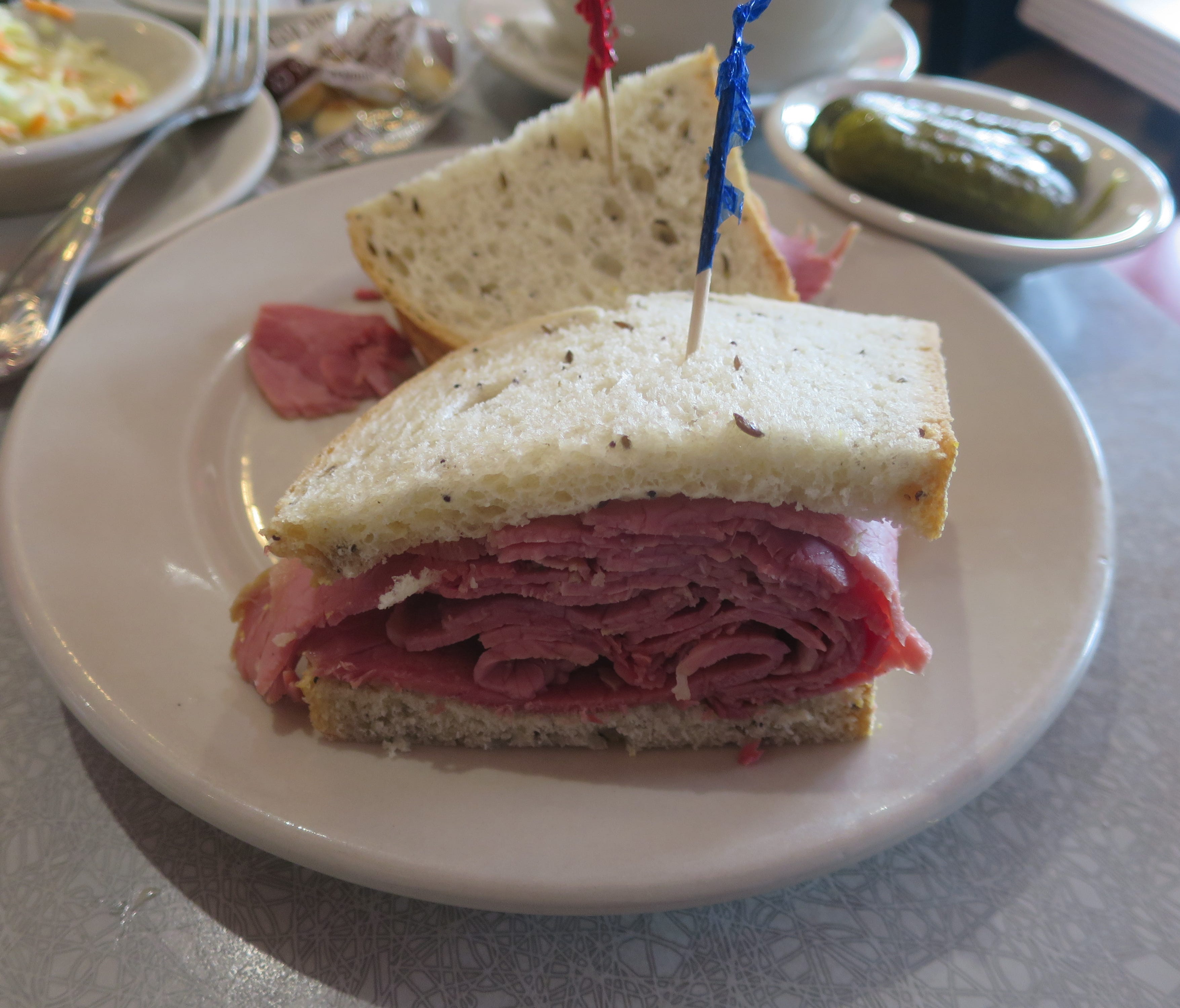 Katz's offers all of its deli sandwiches with half or full meat, and unusually serves both standard and First Cut corned beef. This is a half meat but still generous version of the First Cut.