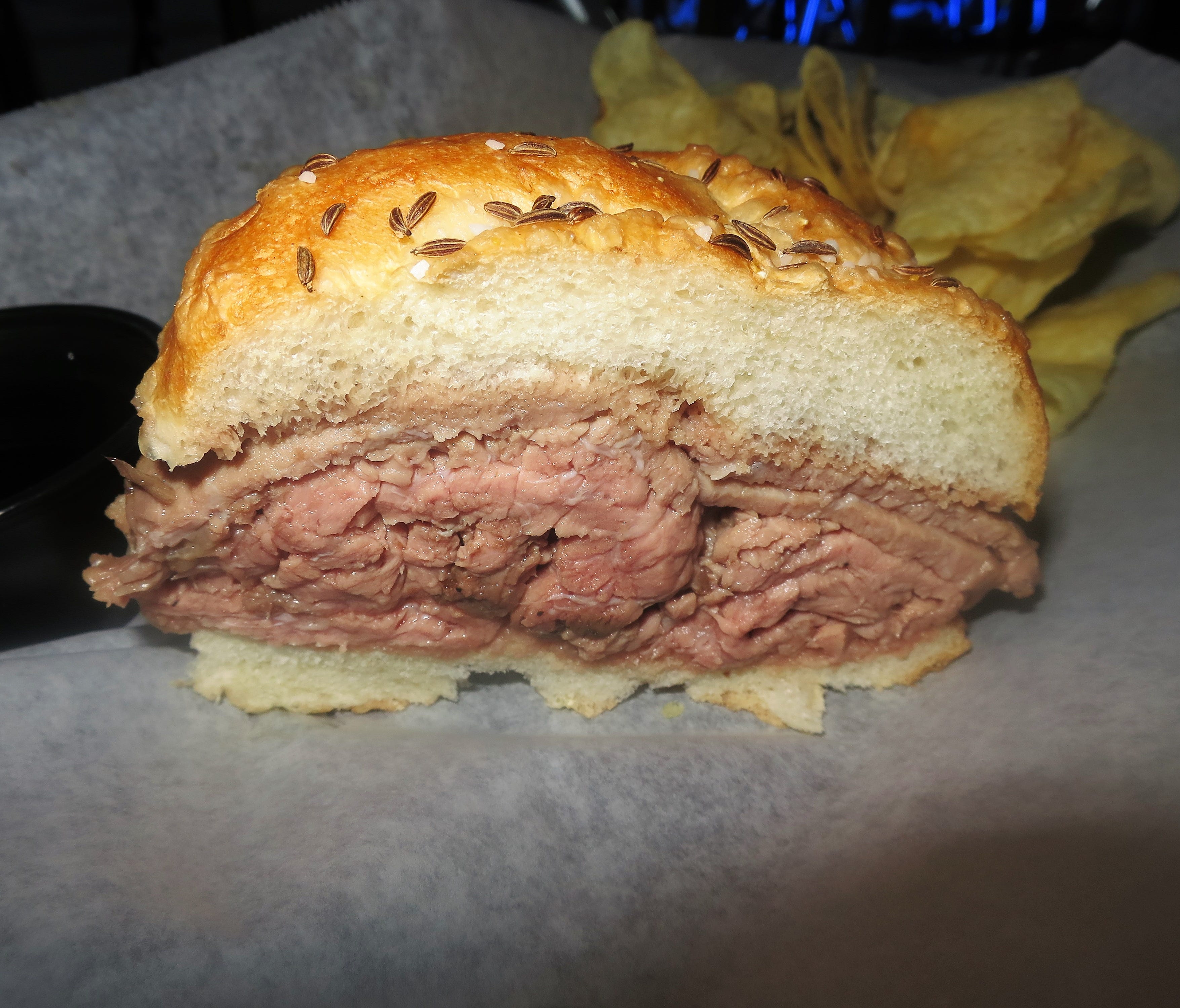 Bar Bill is famous for both Buffalo wings and the beef on weck sandwich, and the restaurant piles the meat on.