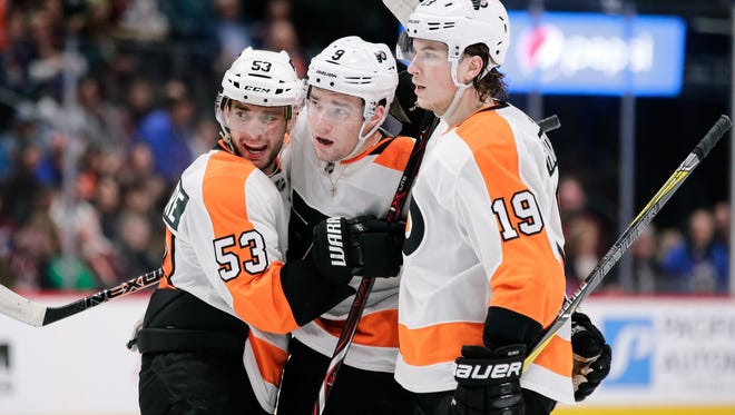 Shayne Gostisbehere, left, has been in the playoffs before, but Ivan Provorov and Nolan Patrick are hoping to make their first appearance in two weeks.