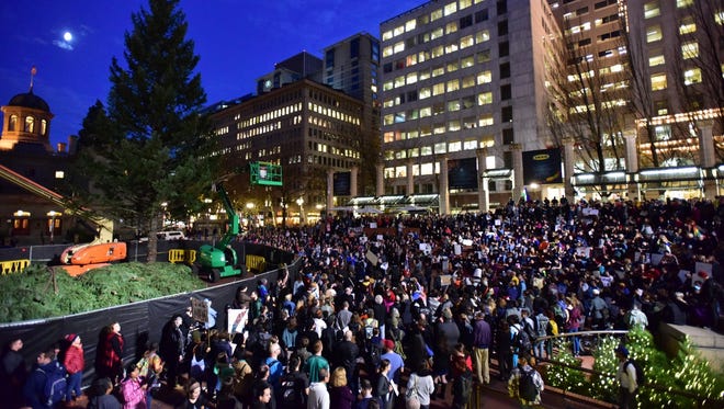 Protesters gather in Pioneer Courthouse Square in Portland, the third night of protests over the results of the 2016 U.S. presidential election, Thursday, Nov. 10, 2016.
