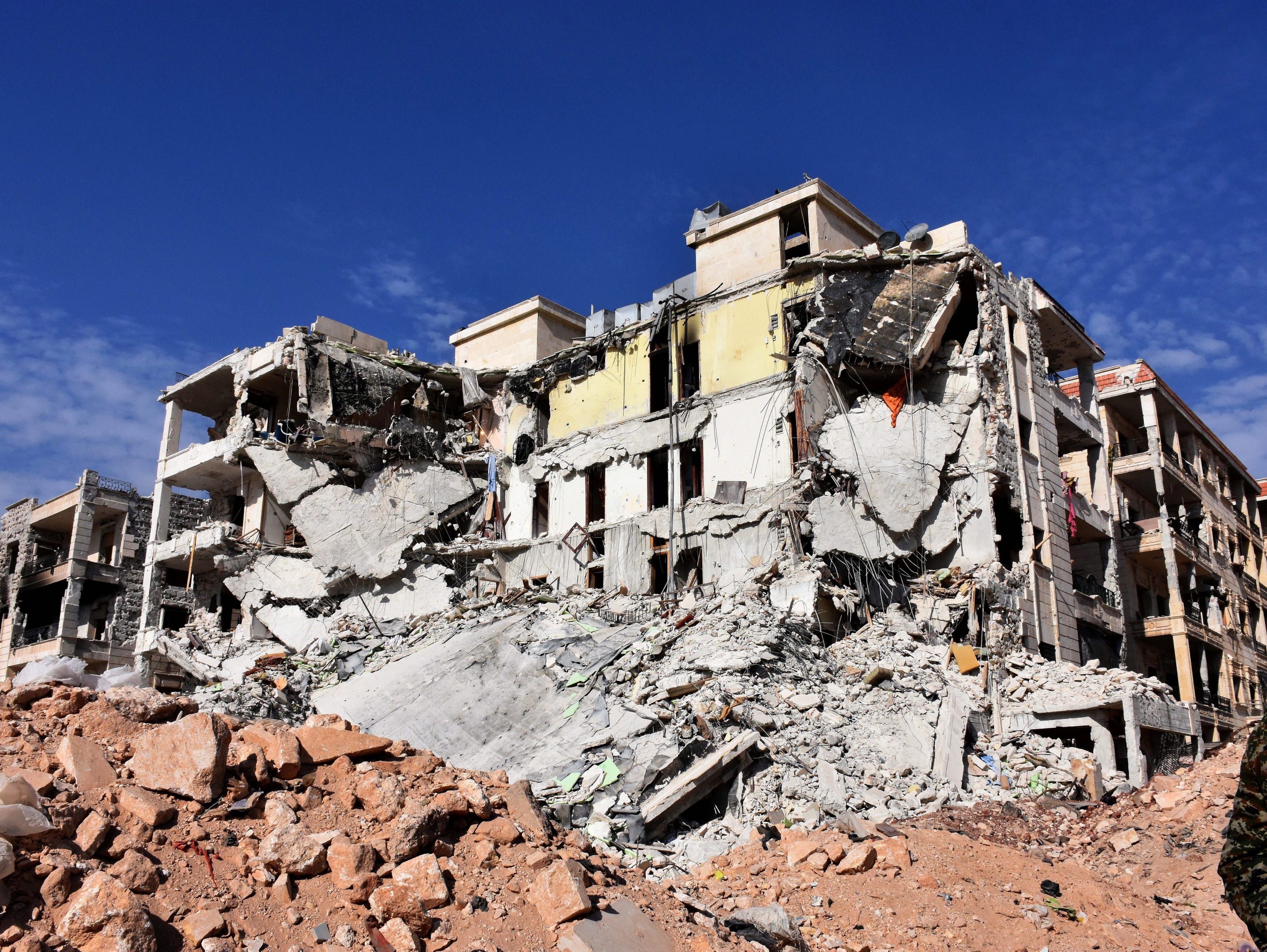Damaged buildings and rubble are seen in Aleppo's western villages of al-Assad district, Aleppo, Syria, on Nov. 12, 2016.