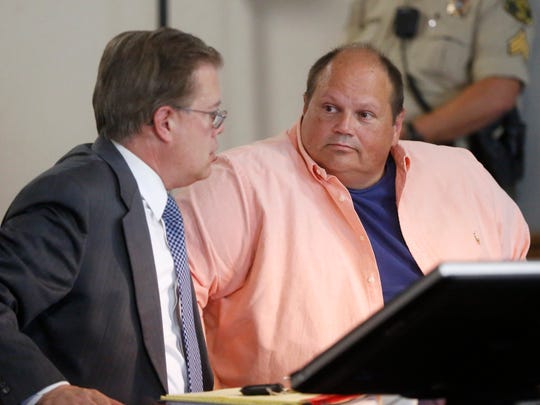 Eddie Tipton looks at his defense attorney Dean Stowers during Tipton's sentencing at the Polk County Courthouse in Des Moines, Iowa, on Aug. 22, 2017.