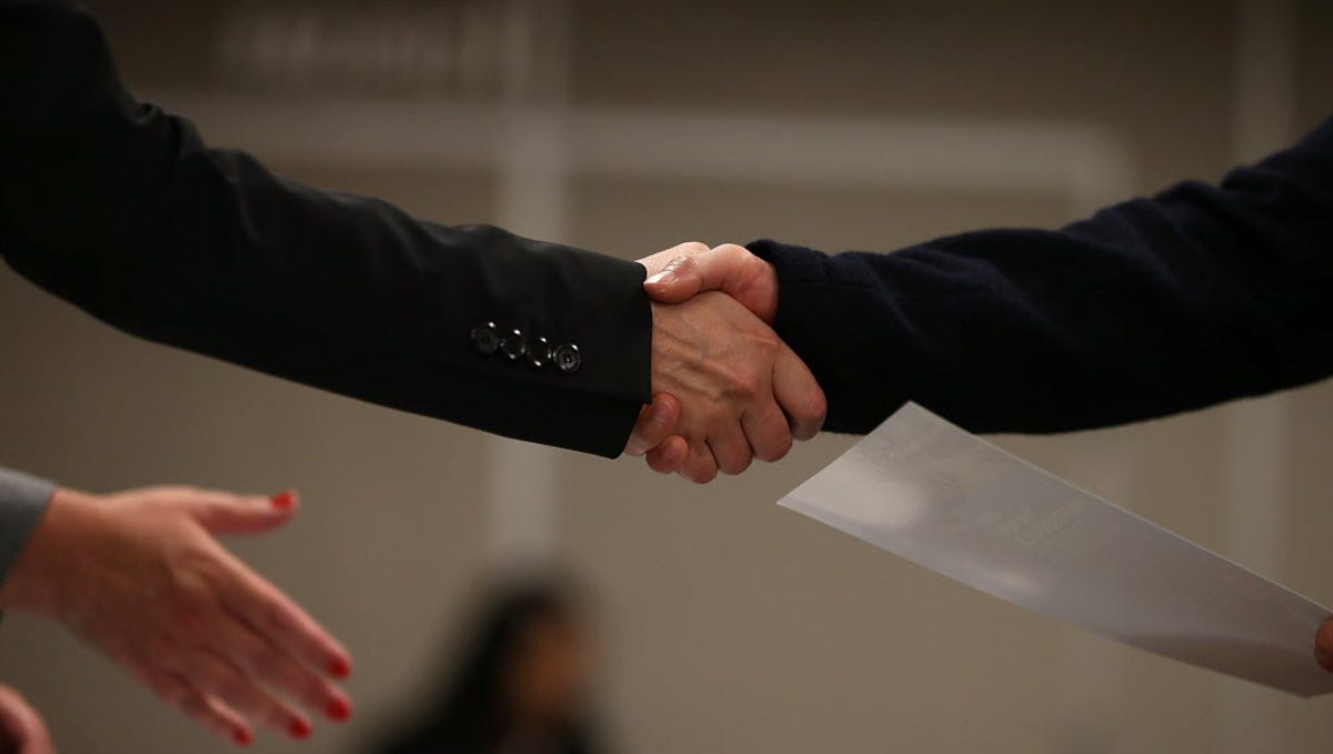 SAN FRANCISCO, CA - JUNE 04:  A job seeker shakes hands with a recruiter during a HireLive career fair on June 4, 2015 in San Francisco, California. According to a report by payroll processor ADP,  201,000 jobs were added by businesses in May.  (Photo by Justin Sullivan/Getty Images) ORG XMIT: 558192427 ORIG FILE ID: 475868206