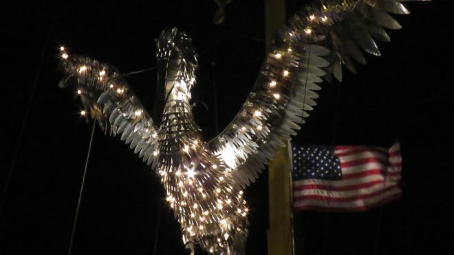The Pelican is lit and waits to be lowered to bring in the new year tonight during the downtown Pensacola New Year's Eve festivities.