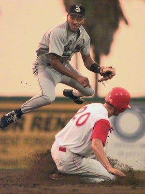 West All-Star Kelly Dransfeldt of the Charlotte Rangers is forced out at second base by East star Julio Lugo of the Kissmmee Cobras during the second inning of the 1998 Florida State League All-Star Game at Hammond Stadium. The West stars defeated the East 5-4.