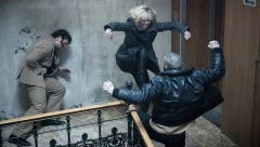 Charlize Theron gives her opponent a kick down the stairs in 'Atomic Blonde.' She followed shortly after.