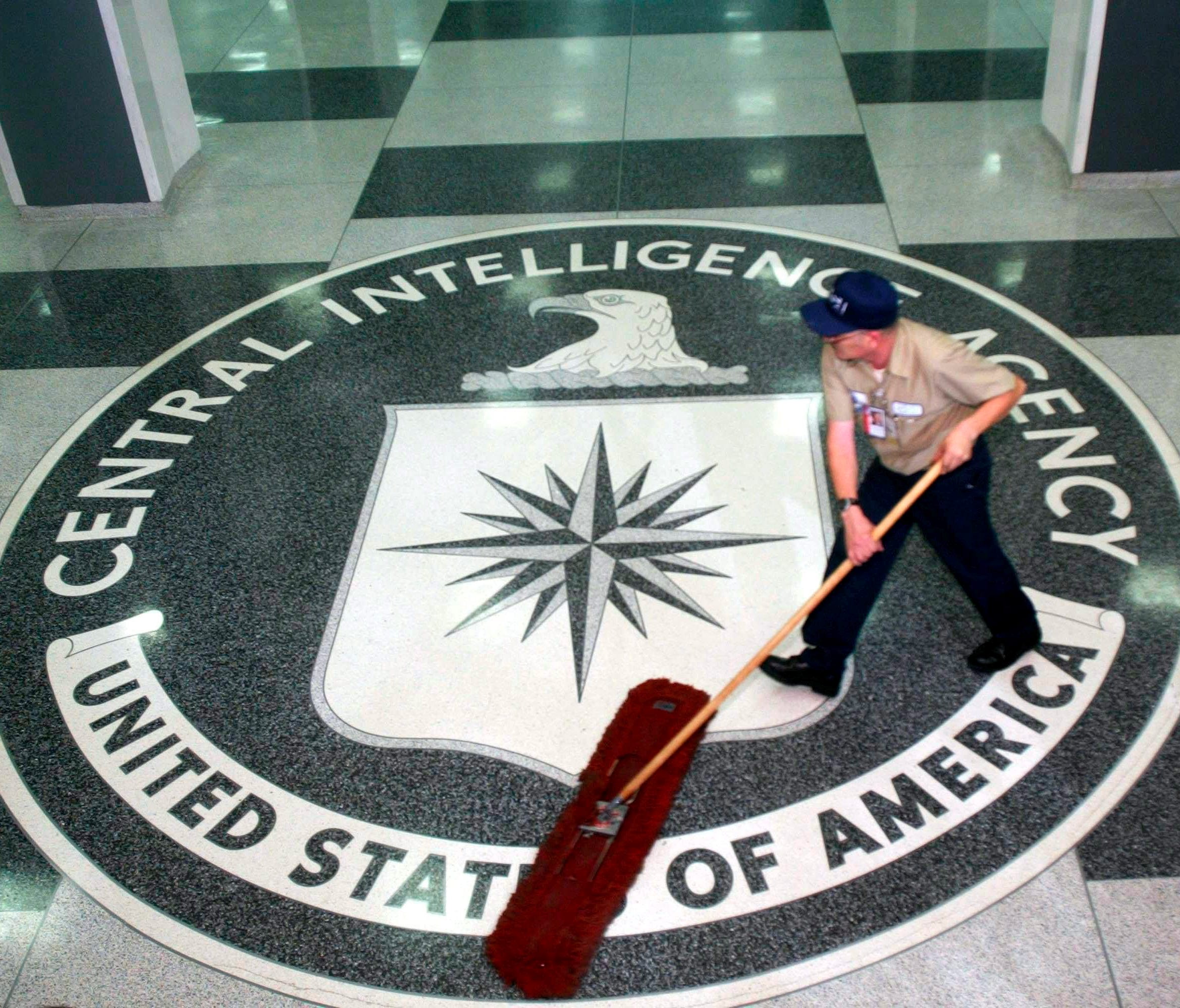 A worker sweeps the foyer clean at CIA headquarters in Langley, Virginia.