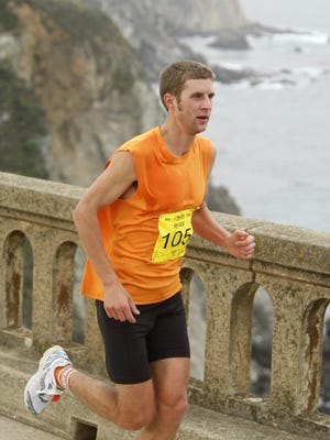 Ryan Hafer of Colorado Springs, Colorado, the winner of the 2009 Big Sur International Marathon, runs across Bixby Bridge.