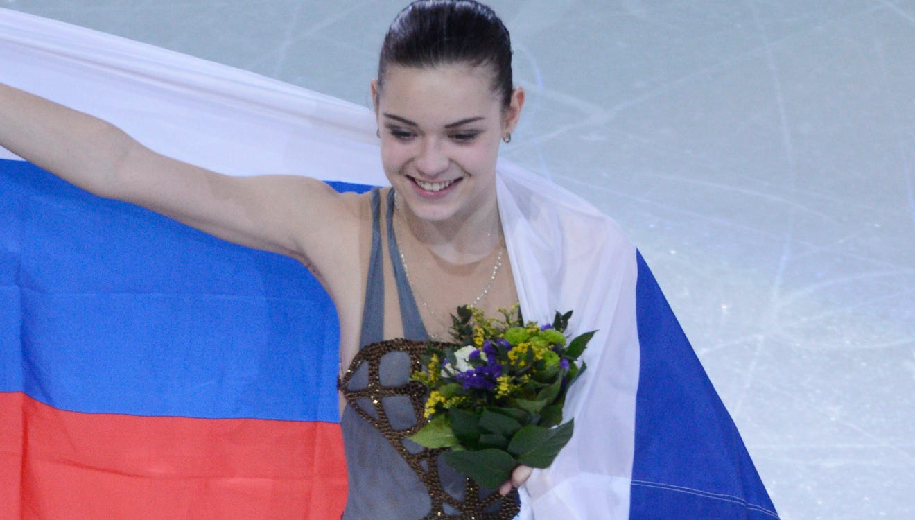 Adelina Sotnikova of Russia stuns Yuna Kim for figure skating gold