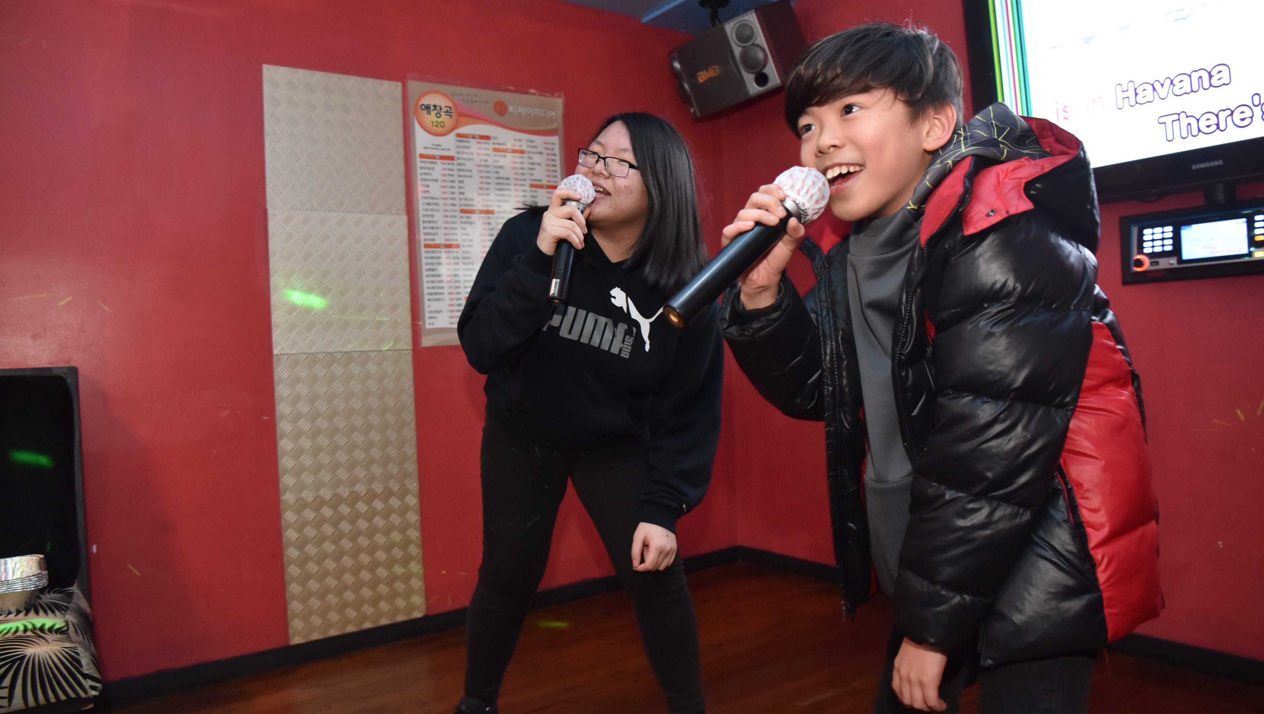 On the eve of Olympics, Korean-style karaoke lets amateurs shine