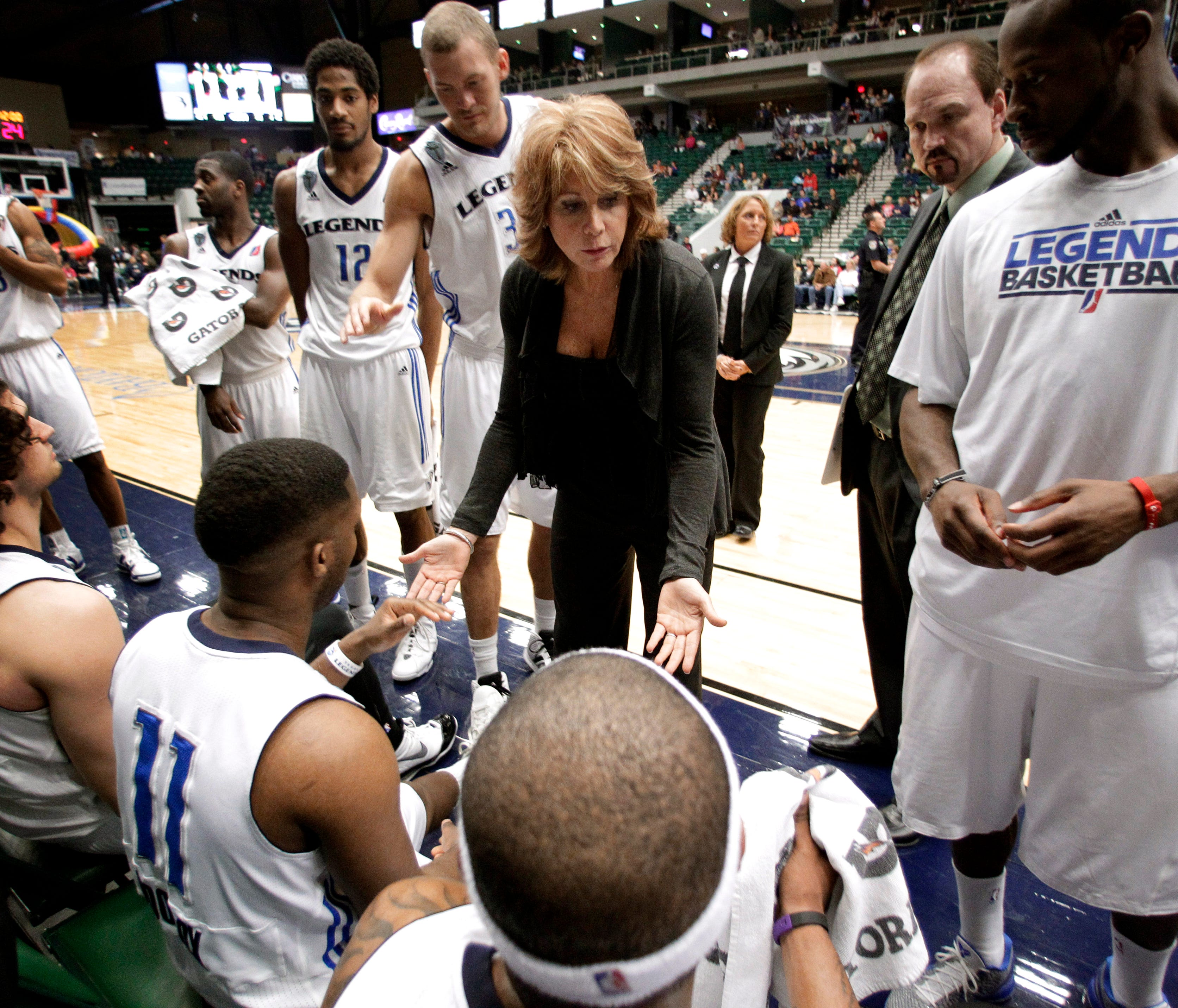 FILE - In this March 30, 2011 file photo, Texas Legends head coach Nancy Lieberman, center, leads her team during a time out in an NBA Development League basketball game against the Springfield Armor in Frisco, Texas.  A person with knowledge of the 