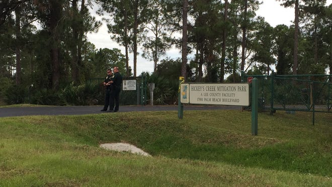 LCSO deputies prepare to close off the entrance to Hickey's Creek Mitigation Park,  where deputies say a child was pulled from a pond.