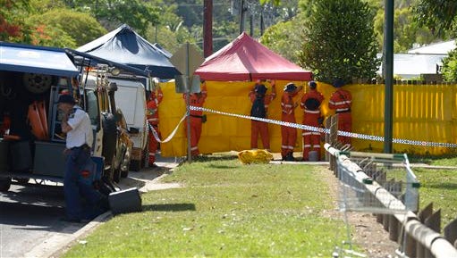 Emergency services workers cover off the perimeter fence of a house where eight children were found dead in a Cairns suburb in far north Queensland, Australia, on Friday. Queensland state police said they were called to the home in the Cairns suburb of Manoora on Friday morning after receiving a report of a woman with serious injuries.When police got to the house, they found the bodies of the children inside, ranging in age from 18 months to 15 years.