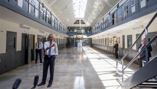 President Barack Obama speaks at the El Reno Federal Correctional Institution,  in El Reno, Okla., Thursday, July 16, 2015. As part of a weeklong focus on inequities in the criminal justice system, the president will meet separately Thursday with law enforcement officials and nonviolent drug offenders who are paying their debt to society at the El Reno Federal Correctional Institution, a medium-security prison for male offenders near Oklahoma City. (AP Photo/Evan Vucci)