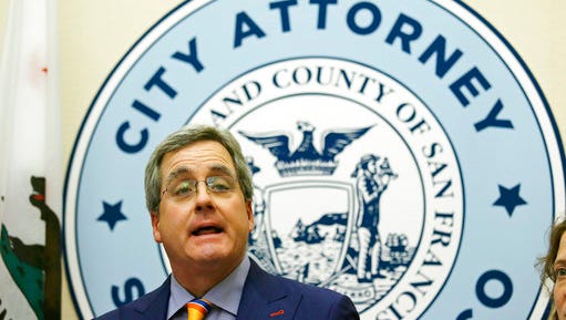 City Attorney Dennis Herrera talks about a federal judge's order blocking any attempt by the Trump administration to withhold money from "sanctuary cities "during a news conference at City Hall Tuesday, April 25, 2017, in San Francisco.