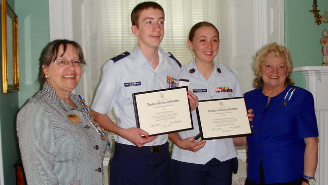 (From left) Beth Pomponio, corresponding secretary, New Jersey State Daughters of the American Revolution; Civil Air Patrol Cadet 2nd Lt. Matthew Currey; Cadet Master Sgt. Taylor Mathis; and Sarah Tarpine Smith, regent, Greenwich Tea Burning Chapter of the DAR, at a luncheon at the 1814 Wood Mansion House Museum in Millville, where Mathis and Currey were presented with awards.