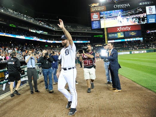 Tigers' pitcher Justin Verlander waves to the crowd