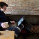 Glitch.com software engineer Melissa McEwen, 33, works from her Logan Square neighborhood home on March 12, 2020. McEwen has worked remotely for five years. (Antonio Perez / Chicago Tribune/TNS)