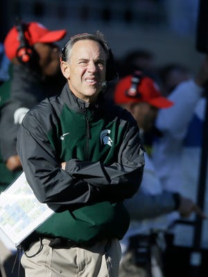 Mark Dantonio and the Spartans moved up a spot in the AP poll and dropped a spot in the coaches poll this week.