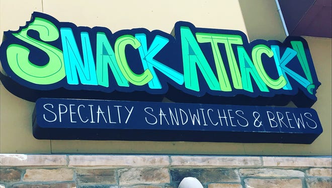A new sandwich shop called Snack Attack has opened out of the old Red Robin Burger Works.