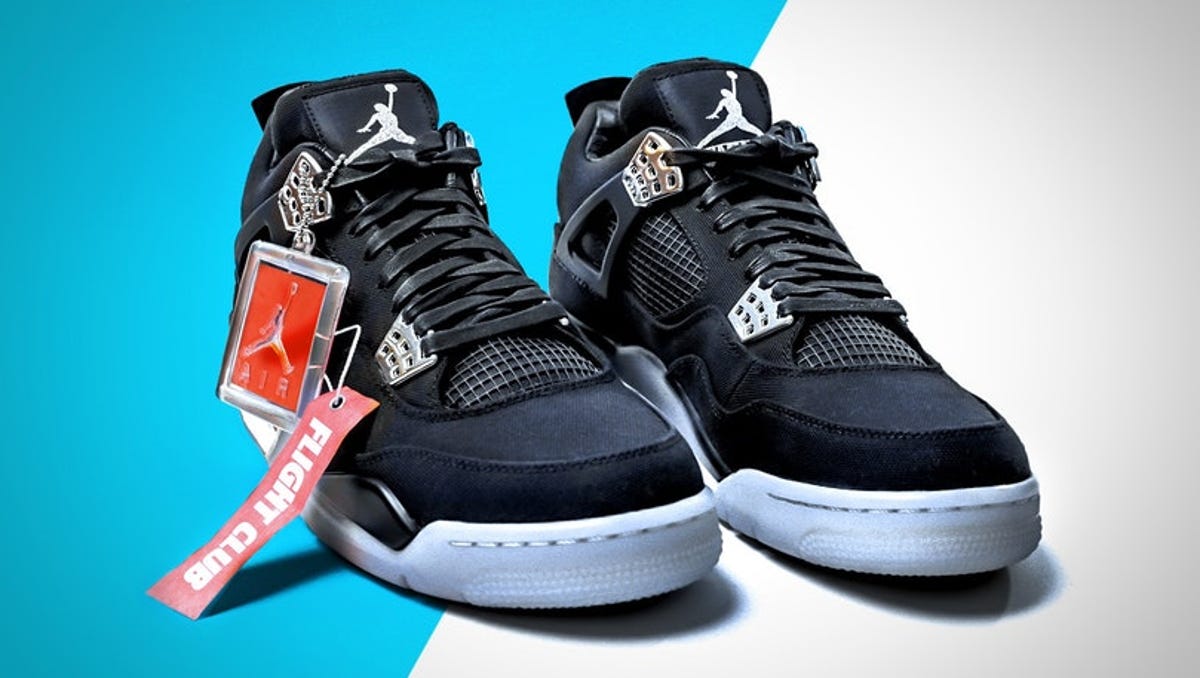 Rare Eminem Nike Air Jordan 4 kicks up for