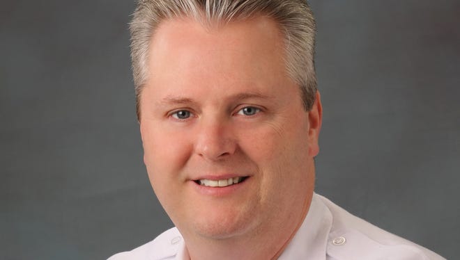 Keizer Fire Chief Jeff Cowan was recognized for 30 years of service.