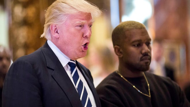 Kanye West and Donald Trump at Trump Tower on Tuesday.