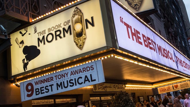 A marquee for "The Book of Mormon" is shown last spring in New York City.